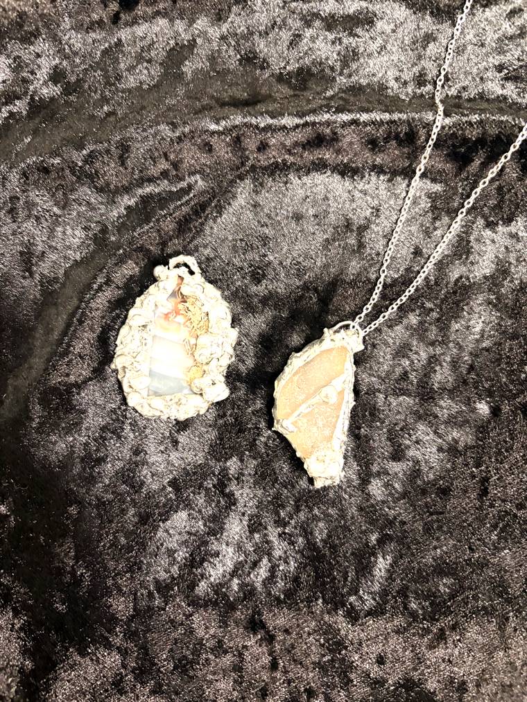 Banded agate and sea glass pendants made at a soft soldering class in Cleveland Heights