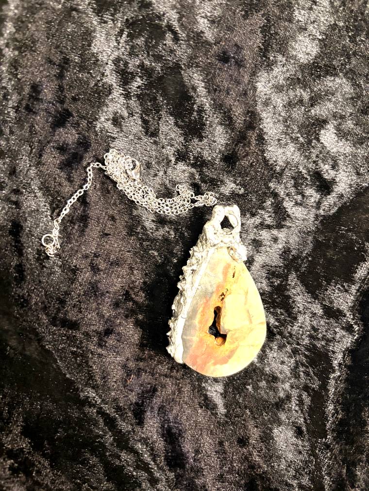Teardrop agate pendant on a silver chain made at a beginner soldering workshop in Ohio
