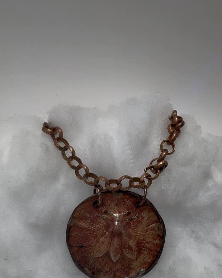 Antique impression die bee pendant with enamel on copper by Northeast Ohio metalsmith Monica