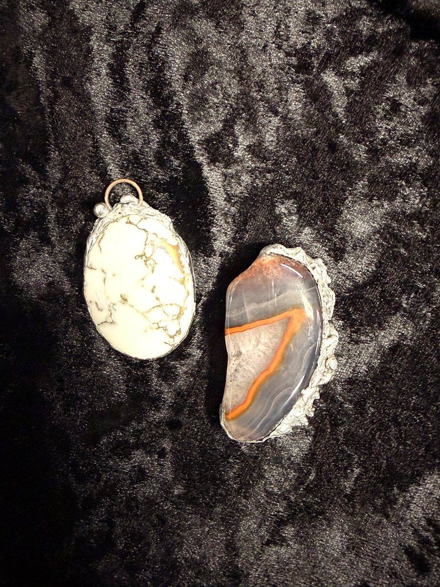 Soldered stone pendant with silver bezel made at a Cleveland Heights craft workshop